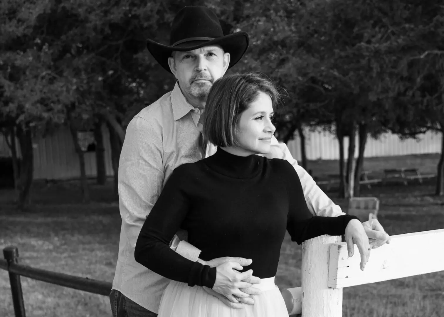 A man and woman posing for the camera.